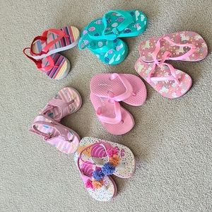 Lot of toddler flip flops